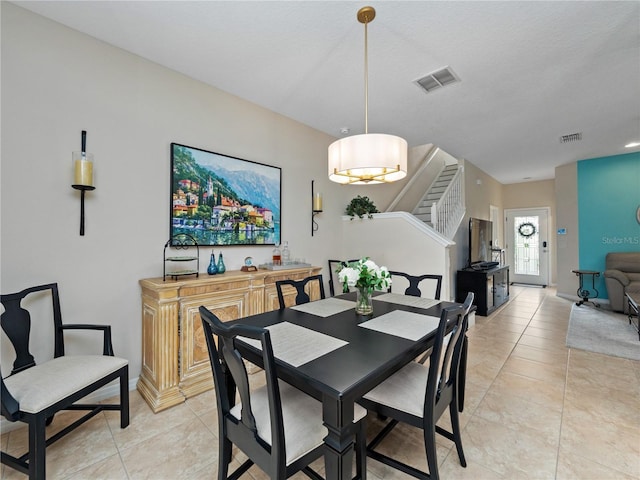 view of tiled dining space