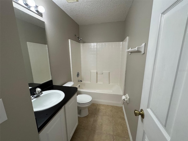 full bathroom featuring toilet, a textured ceiling, shower / washtub combination, vanity, and tile patterned flooring