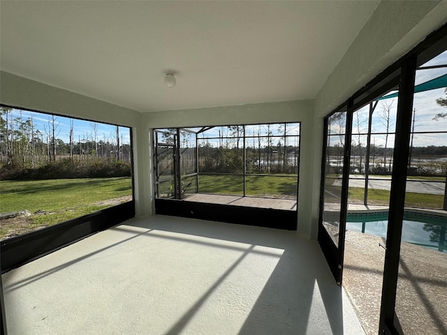 unfurnished sunroom with a wealth of natural light