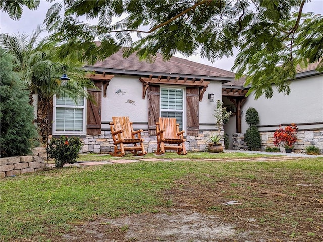 view of front of house with a front lawn