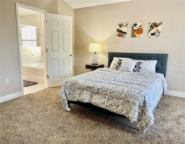 carpeted bedroom with ensuite bathroom