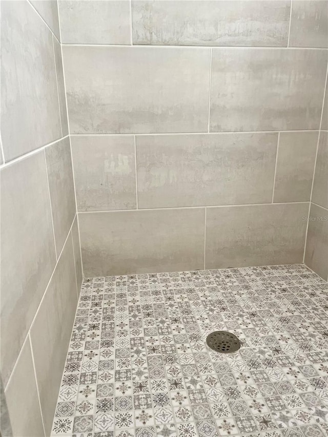 room details with a tile shower