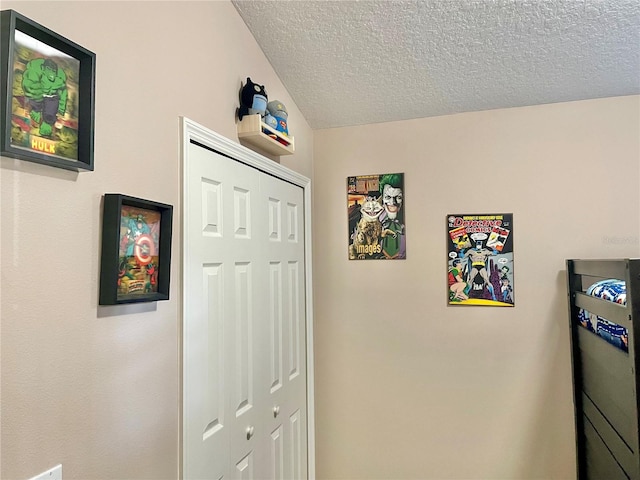 corridor with a textured ceiling