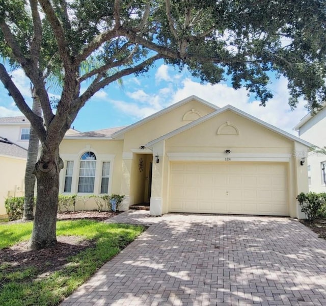 ranch-style home with a garage