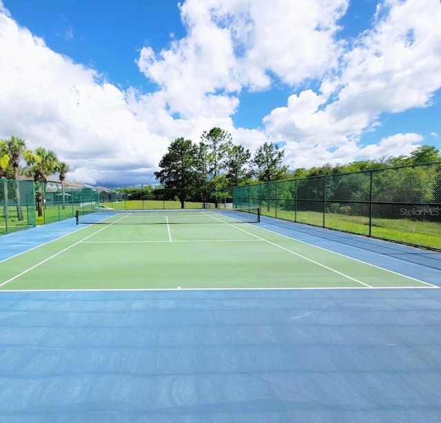 view of tennis court with basketball court