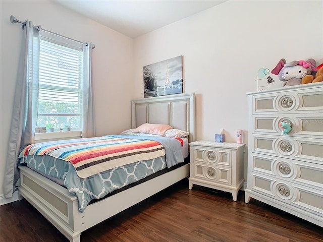 bedroom featuring dark hardwood / wood-style floors