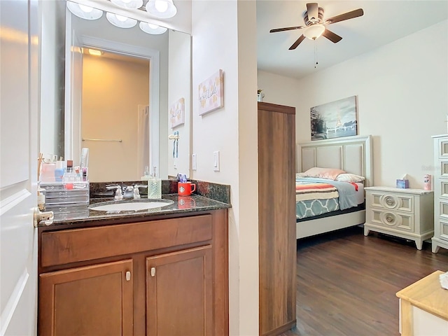 bathroom featuring vanity, wood-type flooring, and ceiling fan