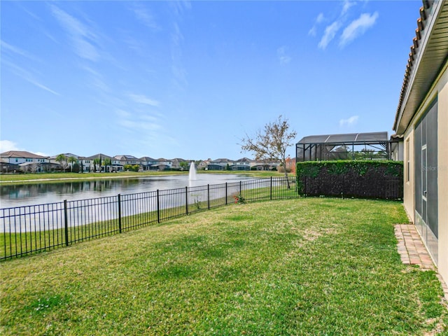 view of yard with a water view