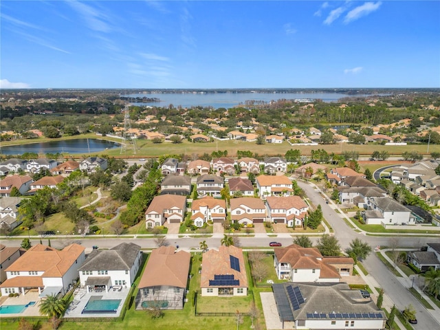 drone / aerial view with a water view