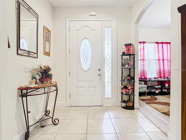 view of tiled foyer entrance