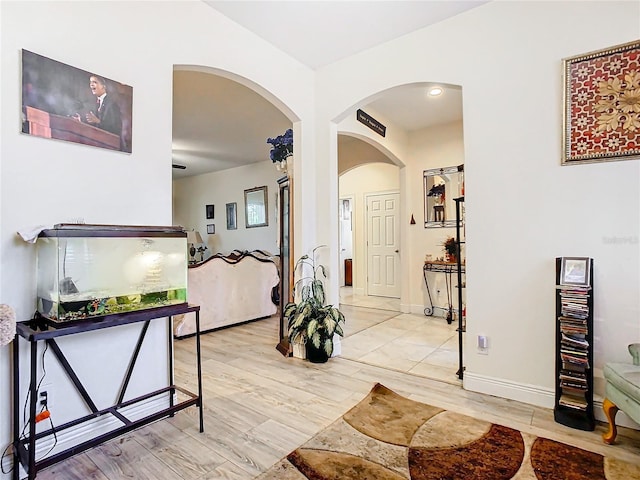 entrance foyer featuring light wood-type flooring