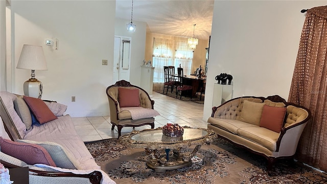 living room with light tile patterned floors and a chandelier