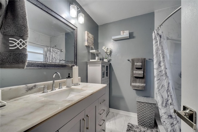 bathroom with vanity and curtained shower