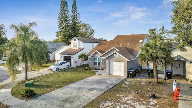 view of front of property featuring a garage and a front lawn