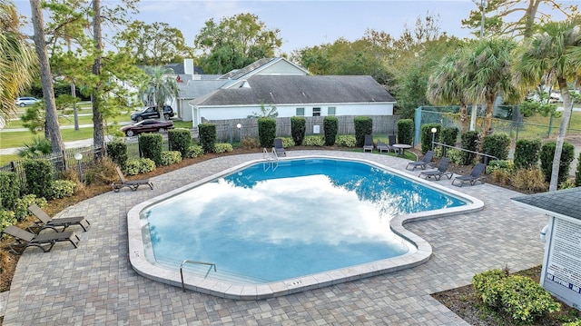 view of pool featuring a patio