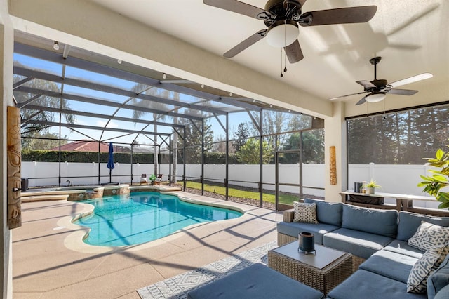 view of pool with an outdoor hangout area, a lanai, and a patio area