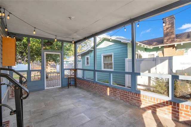 view of unfurnished sunroom