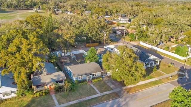 birds eye view of property with a residential view