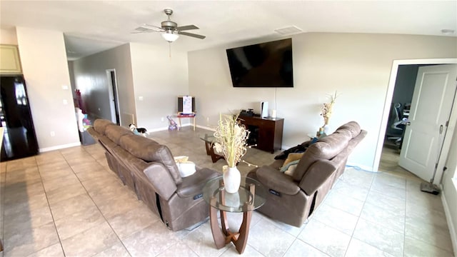 tiled living room with lofted ceiling and ceiling fan