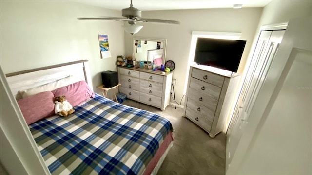 bedroom featuring light carpet and ceiling fan