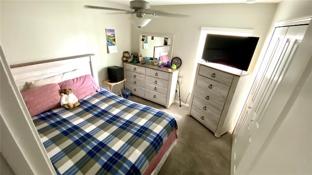 carpeted bedroom with ceiling fan