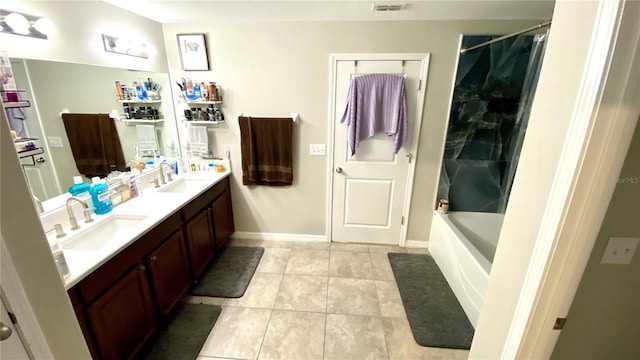 bathroom featuring vanity and shower / bathtub combination with curtain