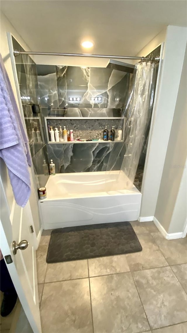 bathroom featuring shower / bath combination with curtain and tile patterned floors