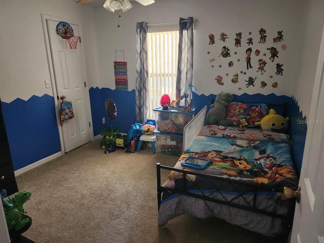 bedroom featuring ceiling fan and carpet flooring