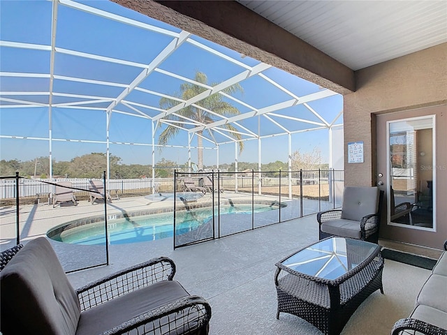 view of patio / terrace featuring a lanai and a fenced in pool