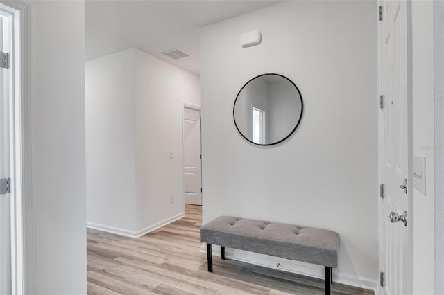 hallway featuring light hardwood / wood-style floors