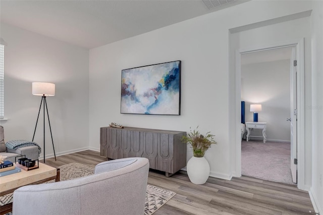 living room featuring light wood-type flooring