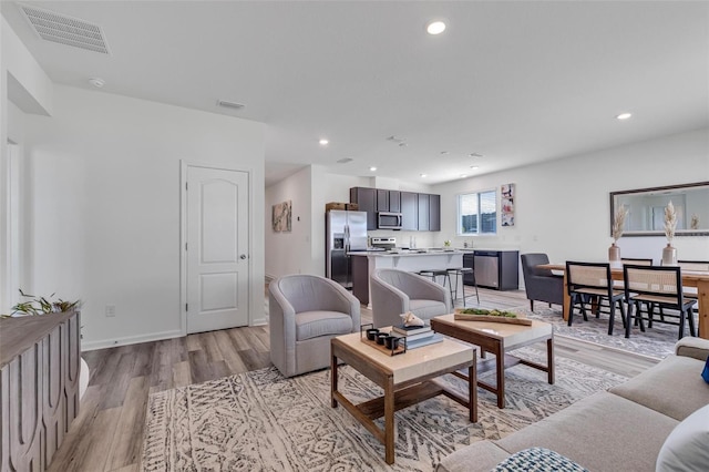 living room featuring light hardwood / wood-style floors