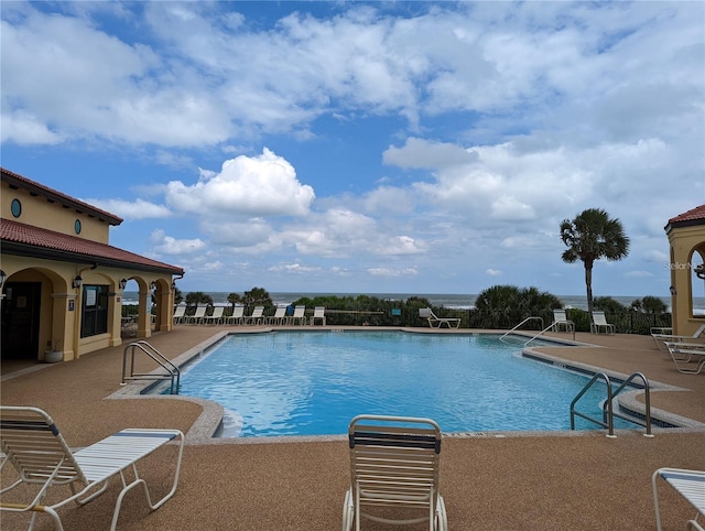 view of pool featuring a patio area