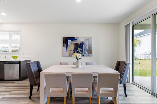 dining room with light wood-style floors