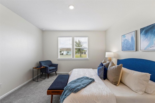 carpeted bedroom with baseboards