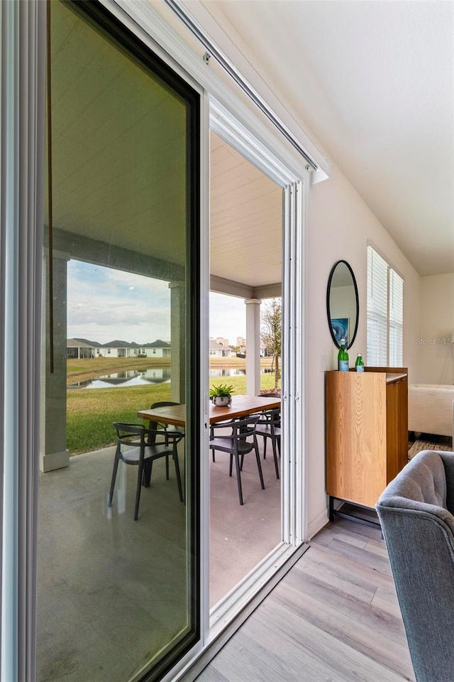 doorway with light wood-style flooring