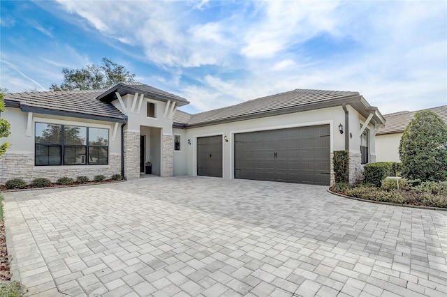 view of front of home with a garage