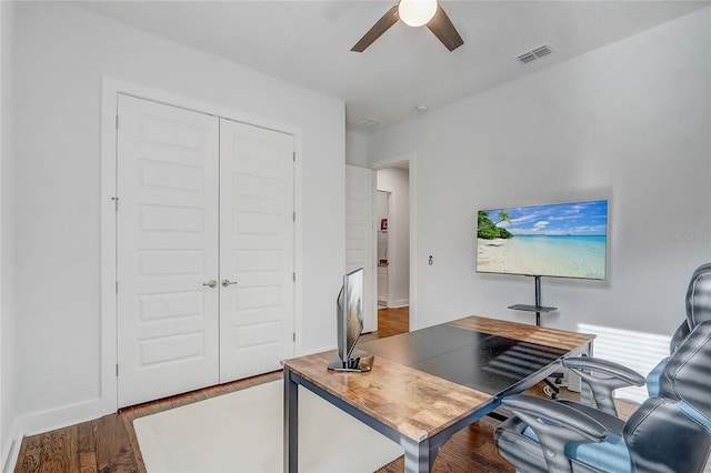 office space featuring hardwood / wood-style floors and ceiling fan