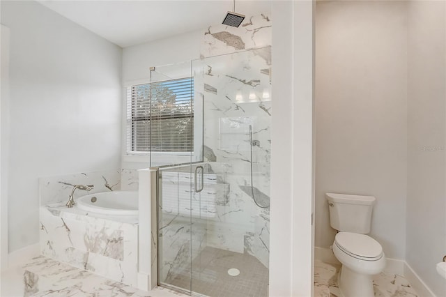 bathroom featuring shower with separate bathtub and toilet