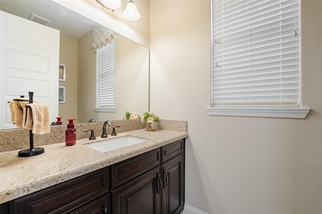 bathroom featuring vanity