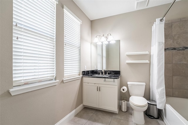 full bathroom with tile patterned flooring, vanity, toilet, and shower / bath combo with shower curtain