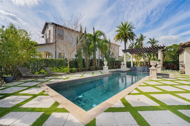 view of swimming pool featuring a pergola and a patio area