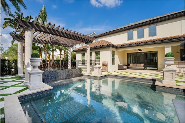 view of pool with a pergola, an outdoor hangout area, ceiling fan, and a patio area