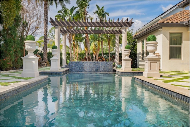 view of pool with a pergola