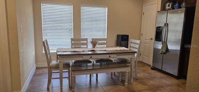 view of tiled dining area