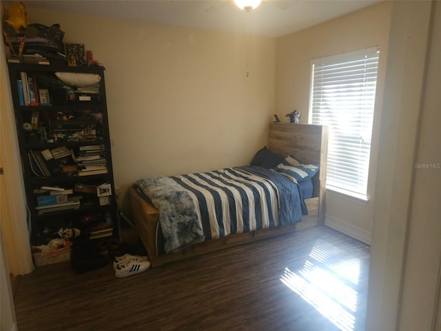 bedroom featuring dark hardwood / wood-style floors