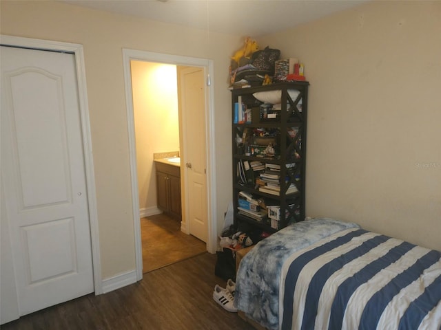 bedroom with dark wood-type flooring