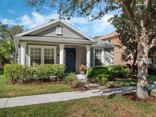 view of front of home with a front yard