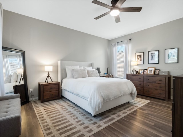 bedroom featuring dark wood-type flooring and ceiling fan