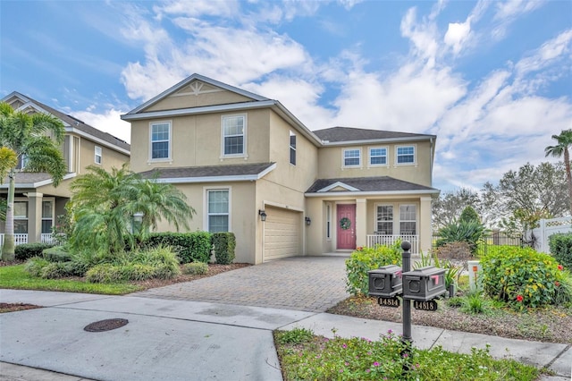 front of property with a garage